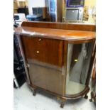 A good quality vintage mahogany china cabinet with abbatant cupboard on ball & claw feet