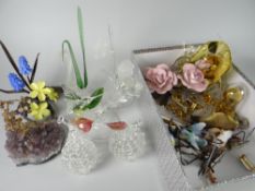 A box containing small glass crystal ornaments, quartz items, various knick knacks etc