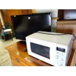 A Sony Bravia flatscreen TV & a microwave E/T