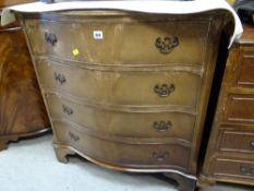 A reproduction chest of four drawers