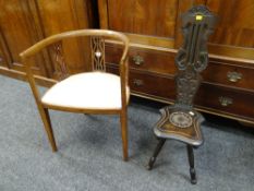 An inlaid mahogany vintage bedroom chair & a carved spinning chair