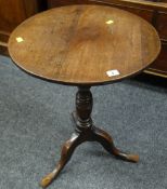 A good antique circular top tripod table