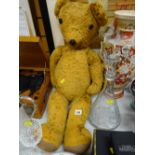 A large English soft toy teddy bear with moving limbs