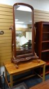 A mahogany bevelled cheval mirror & a hardwood desk