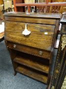 A compact polished vintage bureau with bookcase