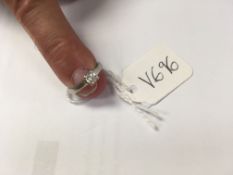 A platinum & diamond solitaire ring, 5 grams approx.