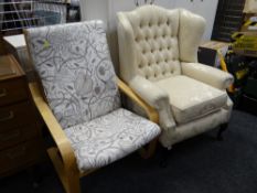 A good reproduction button backed & wing back armchair in a cream fabric together with a modern IKEA