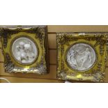 A pair of reproduction gilt framed relief plaques