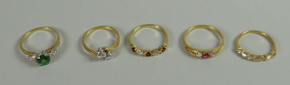 Five yellow metal multi-coloured stone dress rings, many marked 14k