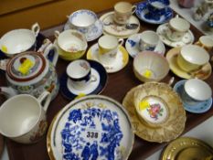 A tray of various china cups & saucers, coffee cans etc