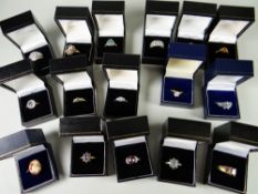 Sixteen dress rings in boxes including white sapphire, blue zircon, green sapphire etc mainly QVC