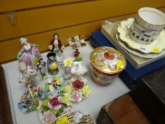 Parcel of china including continental figures, Wedgwood clock, boxed plates etc