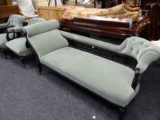 An antique ebonized chaise longue with buttoned velvet upholstery together with a pair of similar