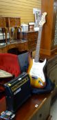 A wood effect electric guitar by Blue Rock with case, cable & Blue Rock amp