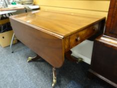 A good antique mahogany sofa table with brass casters & single drawer together with one dummy