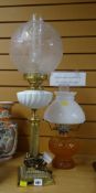 A brass Corinthian columned oil lamp converted to electric together with another