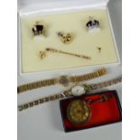 Two modern ladies' wristwatches, miniature crown jewels collection & a yellow metal ladies' fob