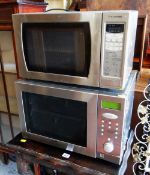 Two silver microwaves ovens E/T