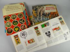 A parcel of vintage Brooke Bond picture cards including British costume, flags of the world, British