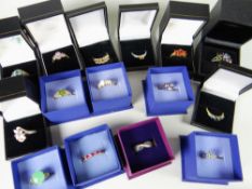 Eighteen dress rings in boxes including opal, pink sapphire, amazonite etc mainly QVC purchases