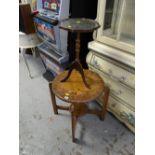 A circular two-tier coffee table & another inset with pre-decimal coins