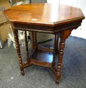 A vintage octagonal top two-tier occasional table