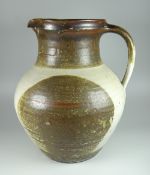 DAVID LLOYD JONES studio pottery large jug with loop handle, ribbed exterior and two tone glaze,