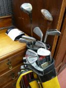 Pair of golf bags with club contents and manual trolley