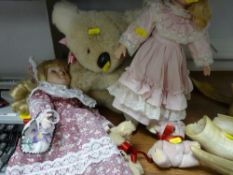 Dolls on stands and other soft toys