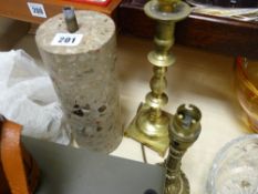 Two brass candlesticks and a mineral lamp holder