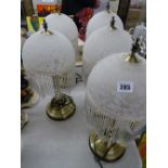 Five matching decorative table lamps with pendant and beadwork lustre shades