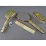 Vintage four piece dressing table hand mirror and brush set