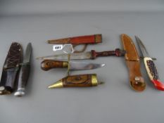 Four vintage and other collector's knives including a North African example