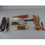 Four vintage and other collector's knives including a North African example