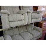 Modern upholstered three piece suite of three seater couch and two armchairs, all having manual