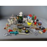 Quantity of collectable dog figurines, drinks bottle stoppers etc