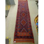 Meshwani carpet runner, red and blue ground with repeating diamond central pattern and bordered
