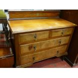 Four drawer walnut railback chest of drawers