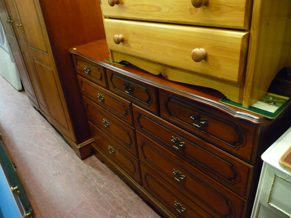 Modern three door wardrobe and a matching multi-drawer chest