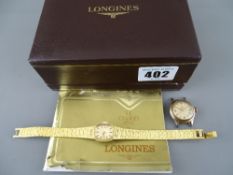Longines yellow metal lady's watch and strap and an Omega lady's watch with stainless steel back