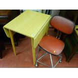 Small melamine drop leaf table and a retro style office chair