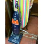 Hoover 2100w upright vacuum cleaner and an ironing board E/T