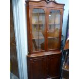 Excellent modern corner cupboard of two upper glazed doors over two base cupboards