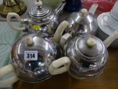 Four Art Deco 'stay hot' teapots with covers