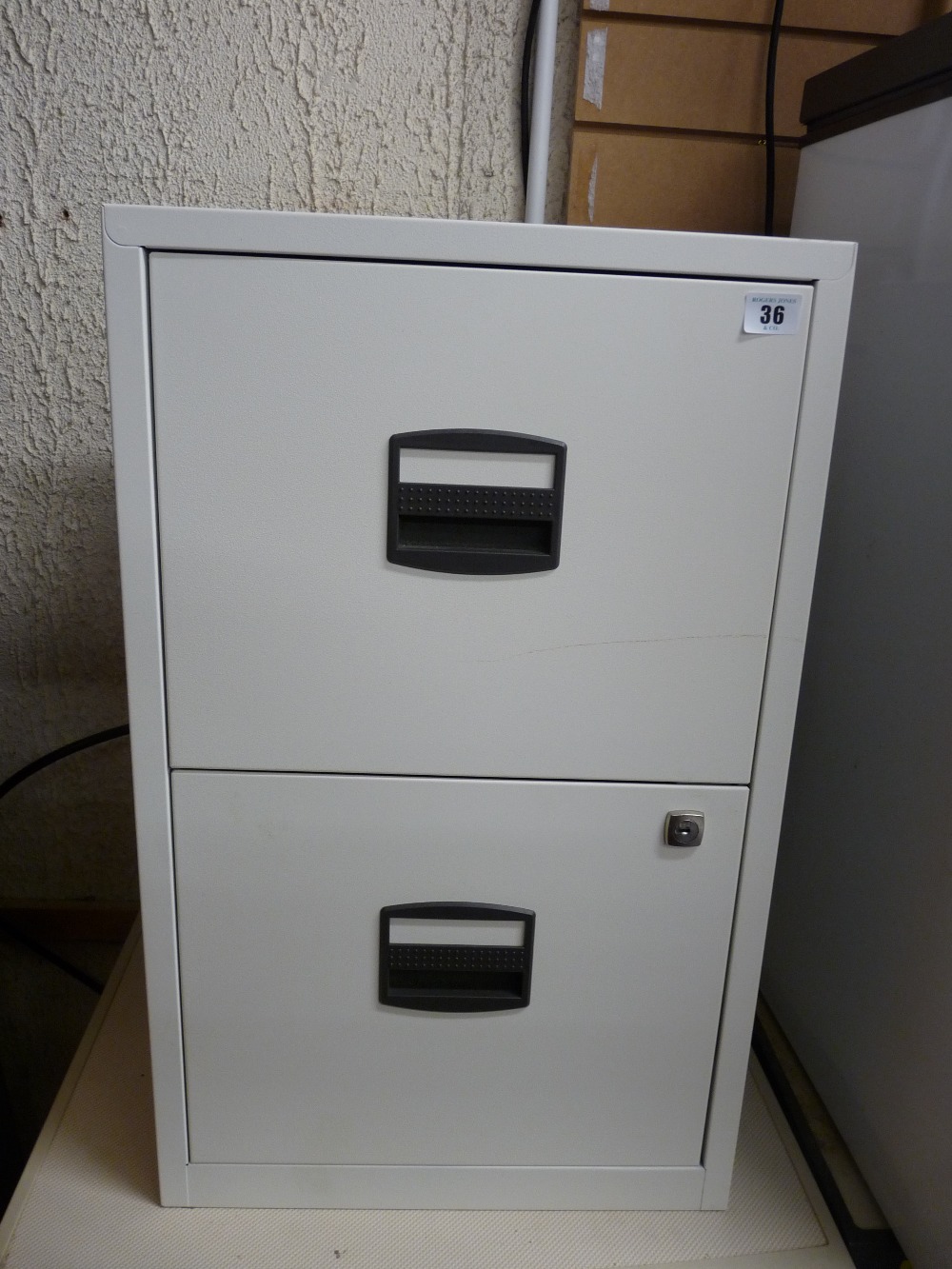 Small compact two drawer metal filing cabinet