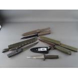 Four modern combat style collector's knives