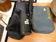Modern monocular labelled 20-60x60 and a cased set of boules