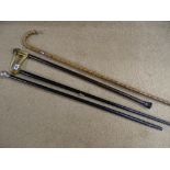 Four vintage walking canes/sticks