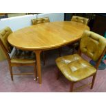 Mid Century oval extending dining table and four vendor gifted chairs