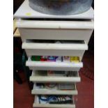 Pair of white plastic stacking drawers and contents of garage items and fixings etc